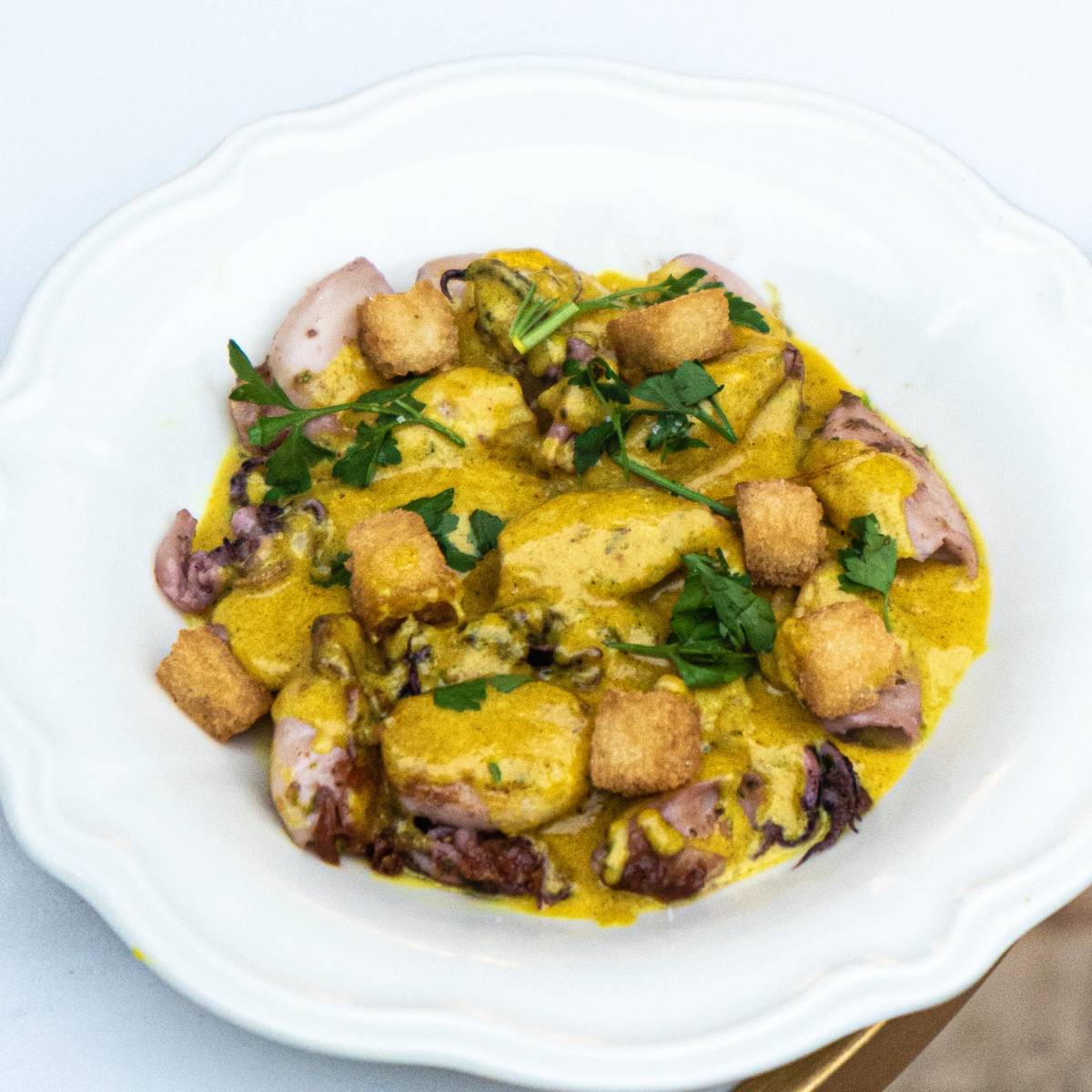 Poêlée de supions<br>en persillade